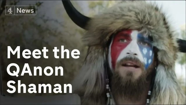 Meet the ‘QAnon shaman’ behind the horns at the Capitol insurrection