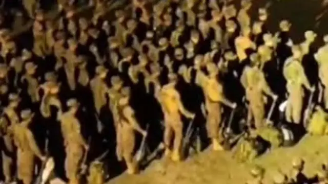 MS-13 GANGSTERS SURROUNDED BY SOLDIERS